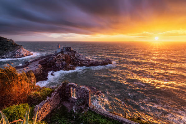 Storm at sunset on the Church of San Pietro, Unesco World Heritage Site, municipality of Porto Venere, La Spezia province, Liguria district, Italy, Europe