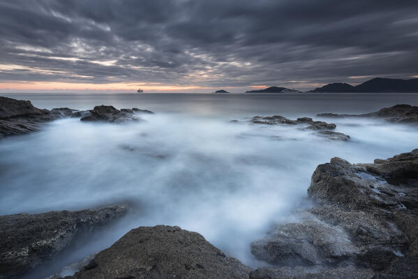 Long exposure on a cloudy day on the Tellaro cliff, municipality of Lerici, La Spezia province, Liguria district, Italy, Europe