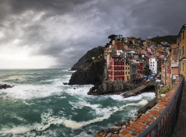 Panoramic view at sunset on the village of Riomaggiore, National Park of Cinque Terre, municipality of Riomaggiore, La Spezia province, Liguria district, Italy, Europe