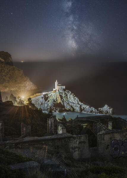 Milky way over the church of Portovenere, municipality of Portovenere, La Spezia province, Liguria district, Italy, Europe
