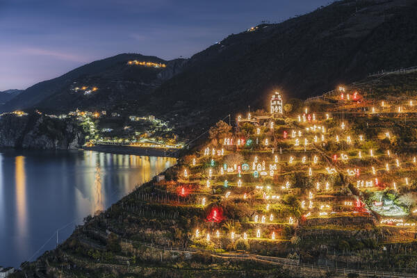 Night on the Manarola nativity scene, behind Corniglia and San Bernardino, Cinque Terre National Park, municipality of Riomaggiore, La Spezia province, Liguria district, Italy, Europe