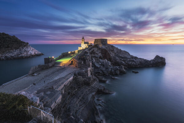 The last lights of the sunset on the horizon in Portovenere, La Spezia province, Liguria, Italy, Europe