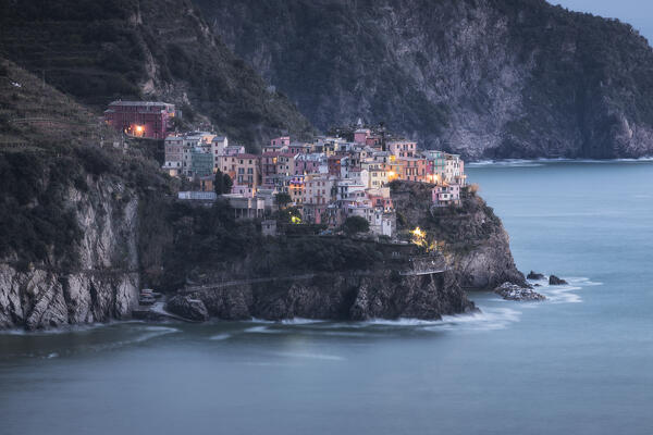 Long exposure in the evening in Manarola, Cinque Terre National Park, municipality of Riomaggiore, La Spezia province, Liguria district, Italy, Europe