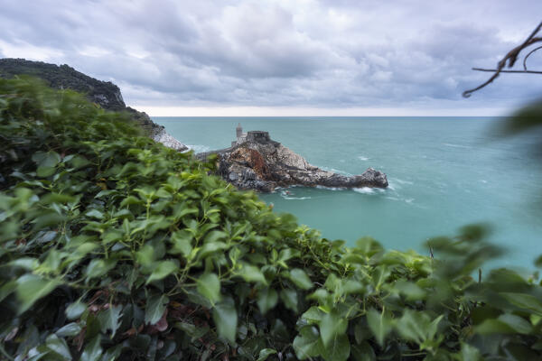 Cloudy sunrise on the San Pietro Church, municipality of Portovenere, La Spezia province, Liguria, Italy, Europe