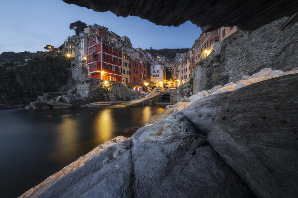 Taken from a crack in the village of Riomaggiore,  National Park of Cinque Terre, municipality of Riomaggiore, La Spezia province, Liguria district, Italy, Europe