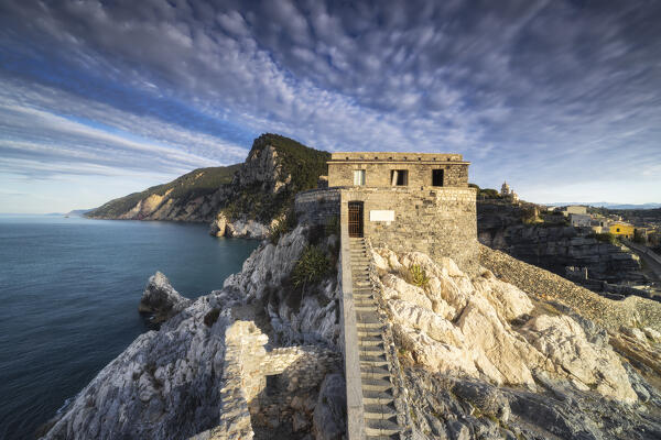 Sunrise seen from above the roof of the church of Portovenere, municipality of Portovenere, La Spezia province, Liguria, Italy, Europe