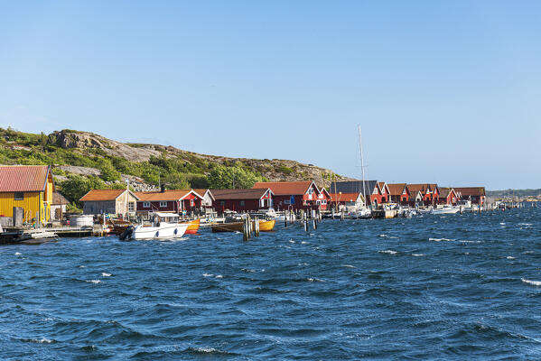 Fisherman's red wooden cabins by the sea, Bohuslan, Vastra Gotaland, West Sweden, Sweden, Scandinavia, Europe