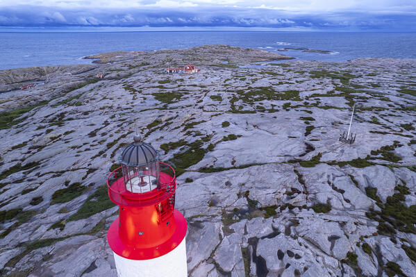 The lighthouse of the granite and smooth island of Hallo off the Smogen coast, Smogen, Bohuslan, Vastra Gotaland, Sweden, Scandinavia, Europe