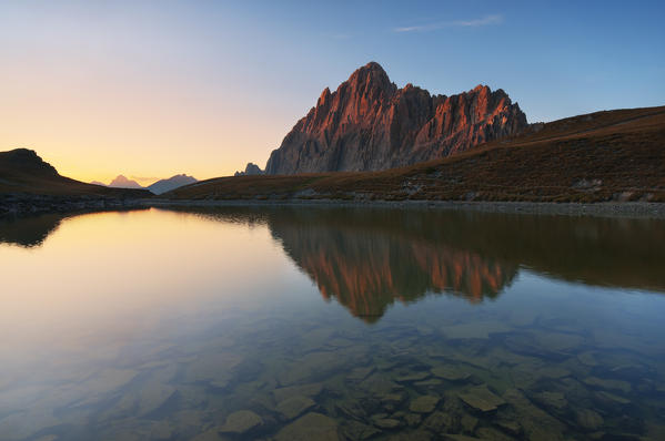 Italy, Piedmont, Cuneo District, Maira Valley - Rocca la Meja at Sunset