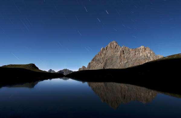 Italy, Piedmont, Cuneo District, Maira Valley - the moonlight on Rocca La Meja