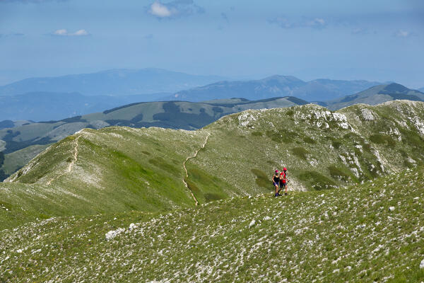 Italy, Lazio, Apennines mountain range, Hikers on Terminillo in Summer