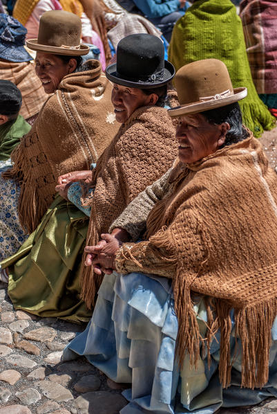 Ayamara women in the typical costume. Aymaras are the native population of the Titicaca Lake area, in Bolivia, South America.