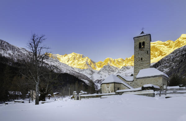 Dawn from the ancient church of Macugnaga, Valle Anzasca, Ossola, province of Verbania, Piedmont, italian alps, Italy