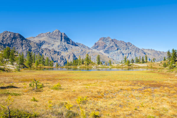 Mont Avic and Mont Ruvic seen from Lake Vallette, Chalamy valley, Mont Avic natural park, Champdepraz, Aosta Valley, Italian alps, Italy