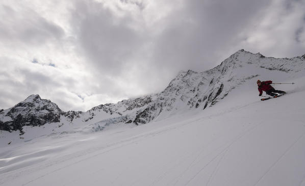 Skier on Disgrazia glacier, Valmalenco, Valtellina, Lombary, Italy