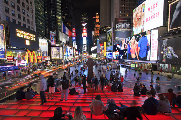 Tourists and local people in Times Square during the night, New York, Unites States of America