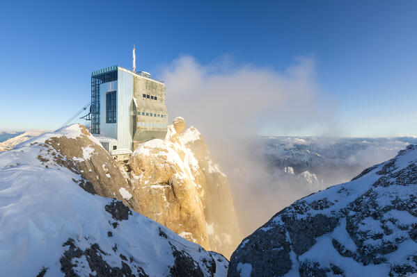 Punta Rocca cable way at sunset. Marmolada, Veneto, Italy, Europe.