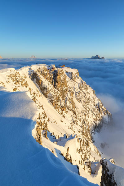 On the top of Piccolo Lagazuoi with the homonym refuge in the background. Cortina d'Ampezzo, Belluno province, Veneto, Italy.