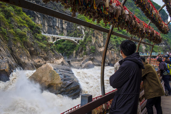 Tourists at Tiger Leaping Gorge, Lijiang, Yunnan Province, China, Asia, Asian, East Asia, Far East,