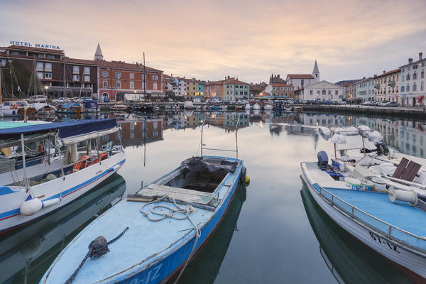 Europe, Slovenia, Primorska, Izola. Old town and the harbour with fishing boats in the morning