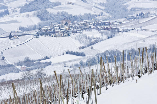 Langhe, Cuneo district, Piedmont, Italy. Langhe wine region winter snow,Barolo castle