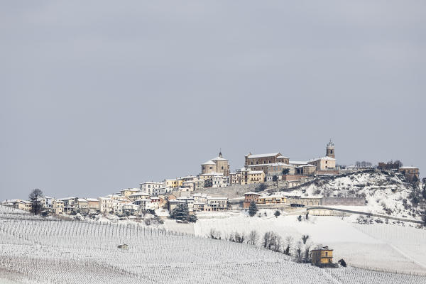 Langhe, Cuneo district, Piedmont, Italy. Langhe wine region winter snow, La Morra village
