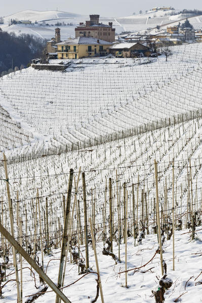 Langhe, Cuneo district, Piedmont, Italy. Langhe wine region winter snow, Barolo castle
