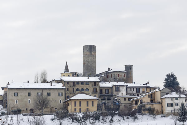 Langhe, Cuneo district, Piedmont, Italy. Langhe wine region winter snow, Castiglione Falletto castle
