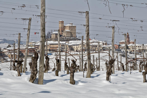 Langhe, Cuneo district, Piedmont, Italy. Langhe wine region winter snow, Serralunga d’Alba castle