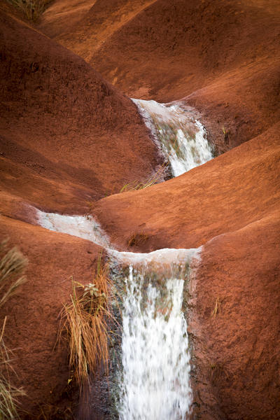 little waterfalls on Waimea Canyon Trail, Waimea Canyon State Park, Kauai island, Hawaii, USA