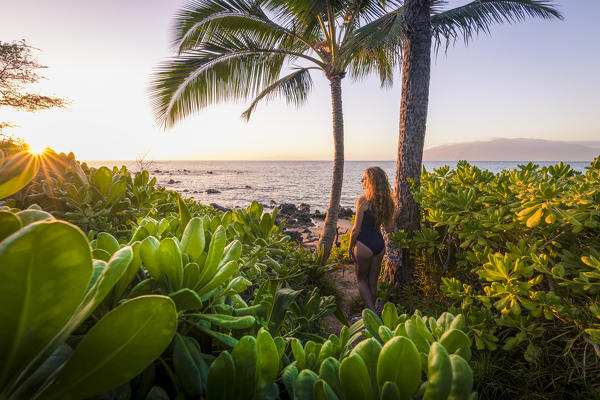 A girl enjoing the sunset in Kihei beach, Maui island, Hawaii, USA (MR)