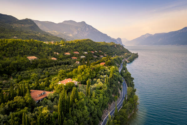 The SS45 road on the Garda Lake coast near Toscolano Maderno, Brescia Province, Lombardy, Italy. 