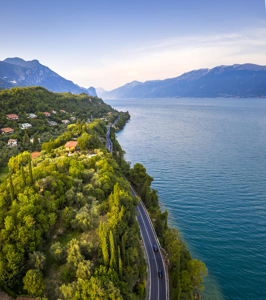 The SS45 road on the Garda Lake coast near Toscolano Maderno, Brescia Province, Lombardy, Italy. 