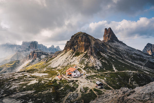 Locatelli refugee during sunset with Scarpieri Tower on the back. Bolzano province, South Tyrol, Italy