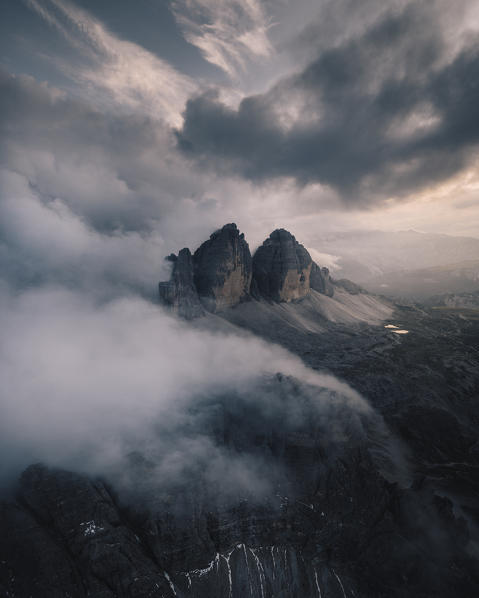 Lavaredo three peaks during a cloudy evening. Aerial view. Bolzano province, South Tyrol, Italy