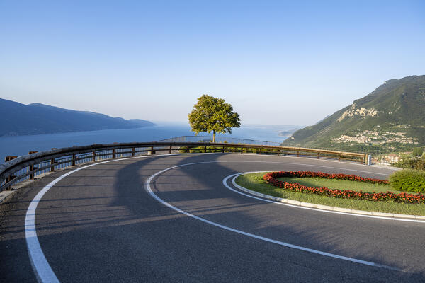 The road descending from Tignale to Garda Lake. Tignale, Garda Lake, Brescia province, Lombardy, Italy