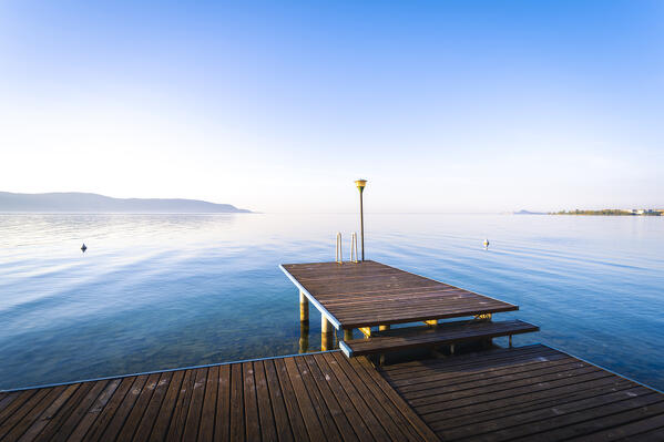 A lonely wharf on Garda Lake, Italy.