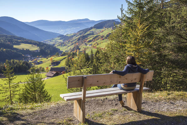 A girl looking at the valley, Puez Odle Natural Park, South Tyrol, Italy