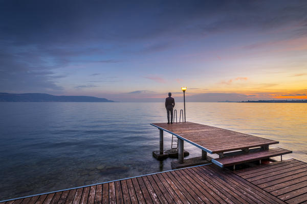 A pier near Toscolano Maderno village, on Garda Lake. Brescia Province, Lombardy, Italy