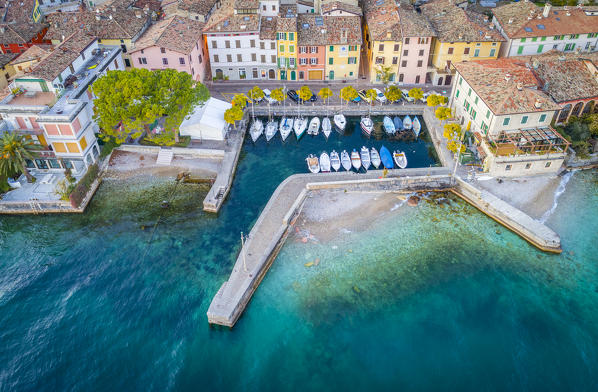 Aerial view of Villa harbour and village. Garda Lake, Brescia Province, Lombardy, Italy