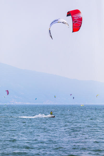 Kite surfers on Garda Lake. Campione del Garda, Brescia district, Lombardia, Italy