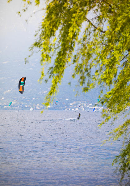 Kite surfers on Garda Lake. Campione del Garda, Brescia district, Lombardia, Italy 