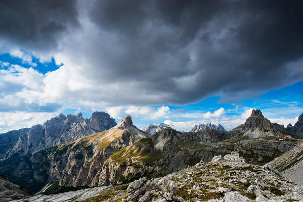 Sesto Dolomites, Trentino Alto Adige, Italy, Europe

Park of the Tre Cime di Lavaredo, the Dolomite mountains taken during a day with clouds. In the background you can see Mount Paterno and the refuge Locatelli