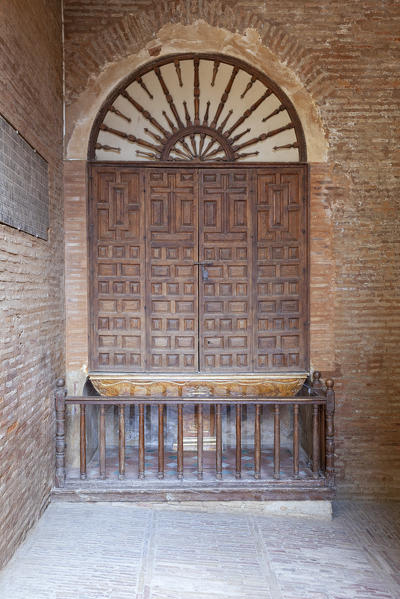 An ancient wooden door in Alhambra, Granada, province of Granada, Andalusia, Spain