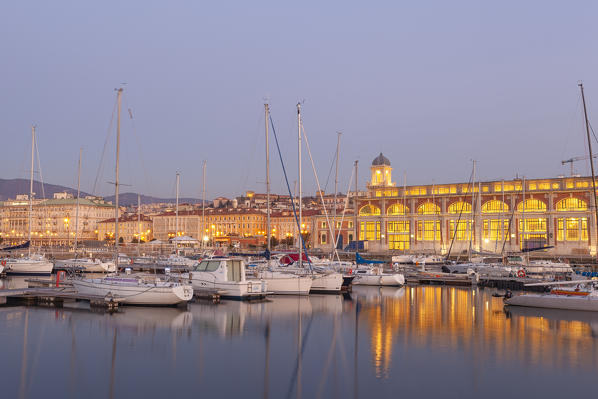 Dusk on the port of Trieste, with the palace called 