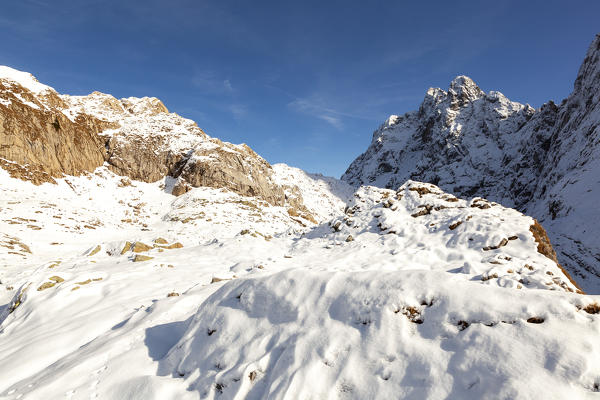 Coglians Mount seen from the slopes of Rauchkofel after a autumn snowfall, Carnic Alps, Lesachtal, Carinthia, Austria.