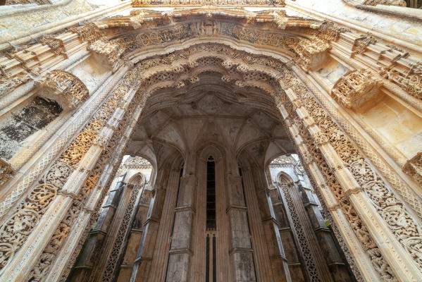 The portal of the Unfinished Chapels (Capelas Imperfeitas) in Batalha Monastery (Mosteiro da Batalha), Batalha municipality, Leiria district, Estremadura province, Portugal.