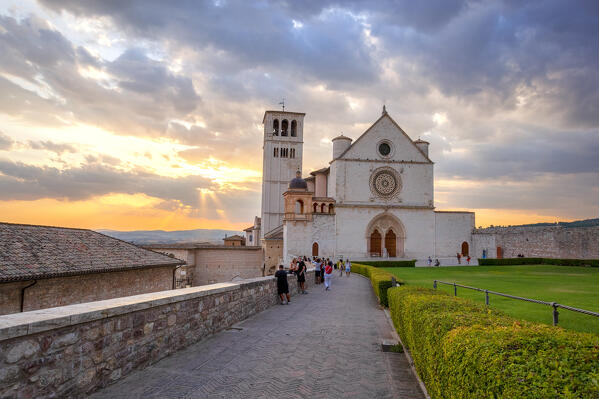 The Basilica of Saint Francis of Assisi at sunset, Assisi, Perugia province, Umbria, Italy.