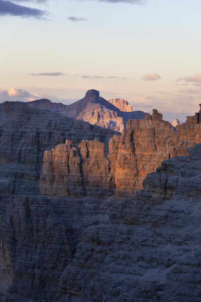 Ridges of dolomites illuminated at sunset, seen from Boè Refuge, Sella Group, Dolomites, Trentino - Alto Adige, Italy.