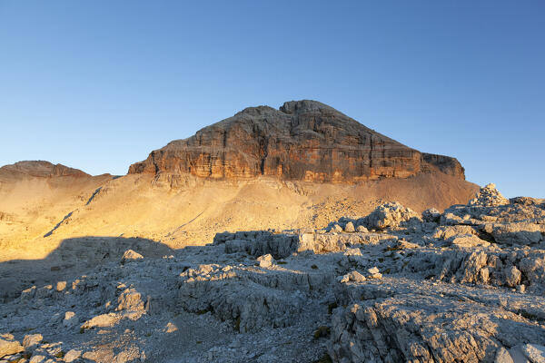 Enrosadira on west face of Piz Boè, Sella Group, Dolomites, Trentino - Alto Adige, Italy.